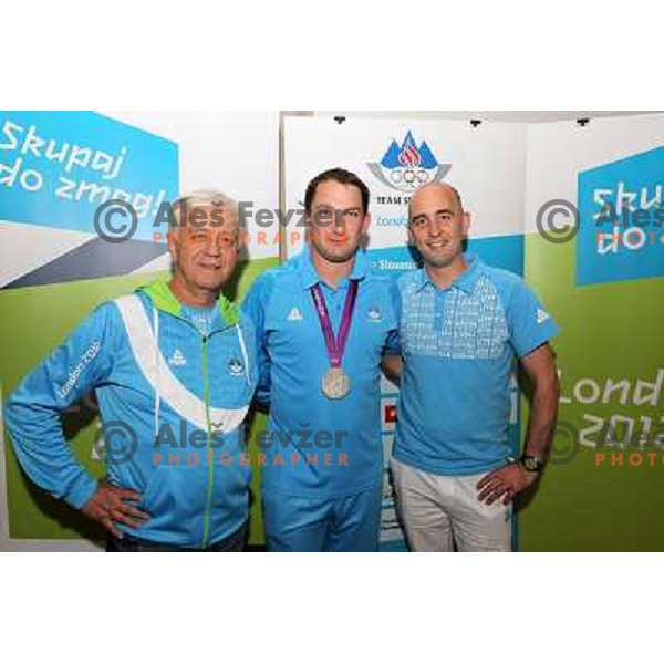 Primoz Kozmus of Slovenia, Olympic silver medalist in hammer throw celebrates his medal with fans in Slovenia pub in Camden during London 2012 Summer Olympic games, Great Britain on August,6 2012 