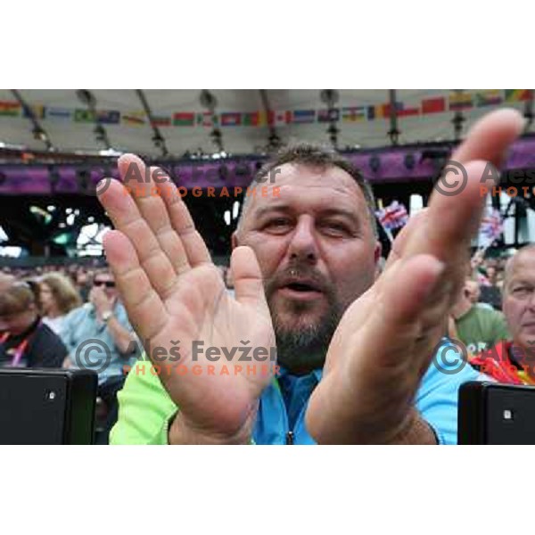 Vladimir Kevo watches qualification of women\'s hammer throw at Olympic stadium during London 2012 Summer Olympic games in August 8, 2012 