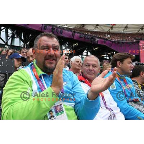 Vladimir Kevo watches qualification of women\'s hammer throw at Olympic stadium during London 2012 Summer Olympic games in August 8, 2012 