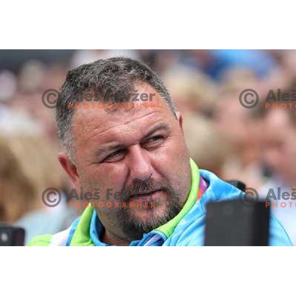 Vladimir Kevo watches qualification of women\'s hammer throw at Olympic stadium during London 2012 Summer Olympic games in August 8, 2012 