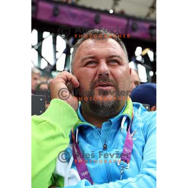Vladimir Kevo watches qualification of women\'s hammer throw at Olympic stadium during London 2012 Summer Olympic games in August 8, 2012 