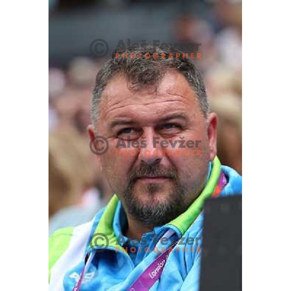 Vladimir Kevo watches qualification of women\'s hammer throw at Olympic stadium during London 2012 Summer Olympic games in August 8, 2012 