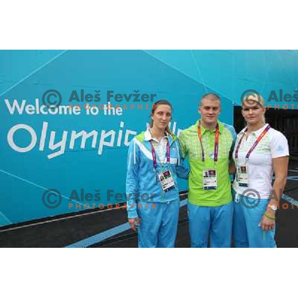 Franka Anic, Ivan Konrad Trajkovic, Nusa Rajher of Slovenia taekwondo team pose in front of Olympic Village during London 2012 Summer Olympic Games, Great Britain on August 8, 2012 