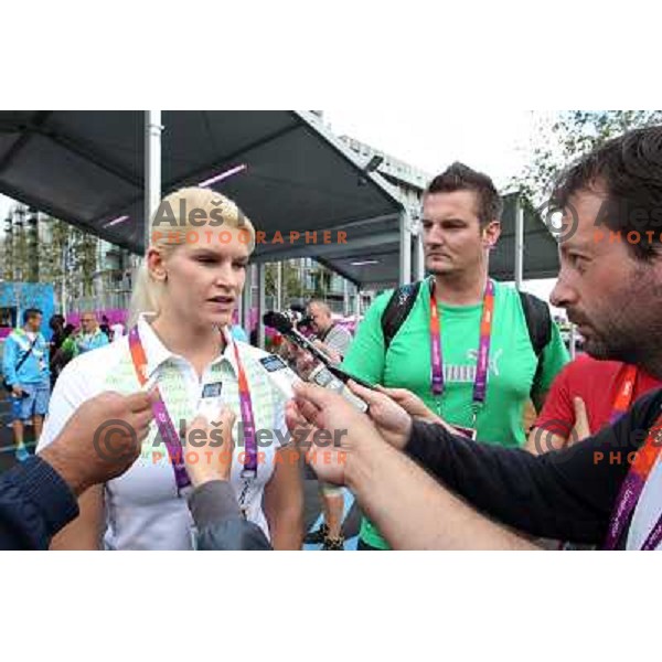 Nusa Rajher of Slovenia taekwondo team talks to journalists in front of Olympic Village during London 2012 Summer Olympic Games, Great Britain on August 8, 2012 