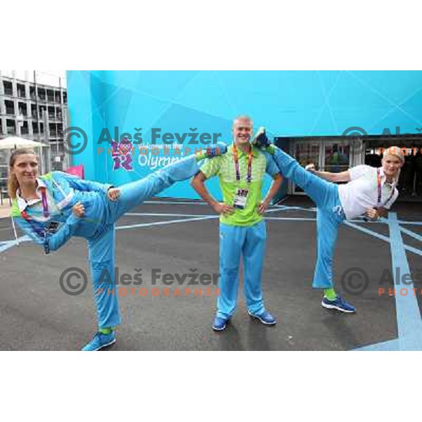 Franka Anic, Ivan Konrad Trajkovic, Nusa Rajher of Slovenia taekwondo team pose in front of Olympic Village during London 2012 Summer Olympic Games, Great Britain on August 8, 2012 