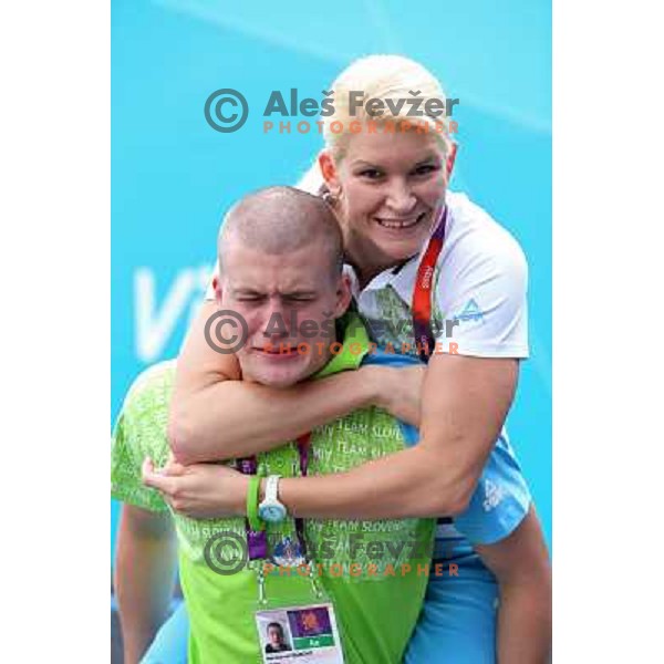 Ivan Konrad Trajkovic, Nusa Rajher of Slovenia taekwondo team pose in front of Olympic Village during London 2012 Summer Olympic Games, Great Britain on August 8, 2012 