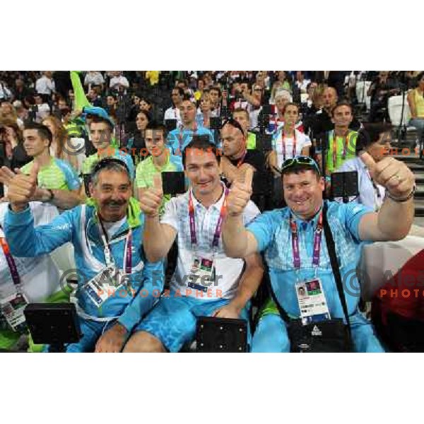 Khalid Nasif, Primoz Kozmus and coach Andrej Hajnsek watch Martina Ratej of Slovenia who competes in the final of women\'s javelin throw at Olympic Stadium during London 2012 Summer Olympic Games, Great Britain on August 9, 2012 