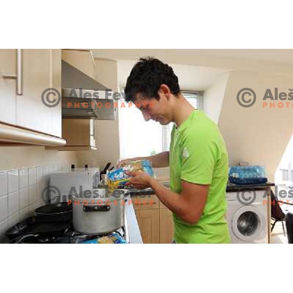 Urban Ferencak prepares lunch in apartment of hotel Camelia in Southend on Sea, british town and seaside resort in Essex during London 2012 Summer Olympic games on August 9, 2012 