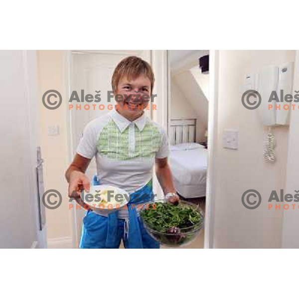 Tanja Zakelj serving lunch in apartment of hotel Camelia in Southend on Sea, british town and seaside resort in Essex during London 2012 Summer Olympic games on August 9, 2012 