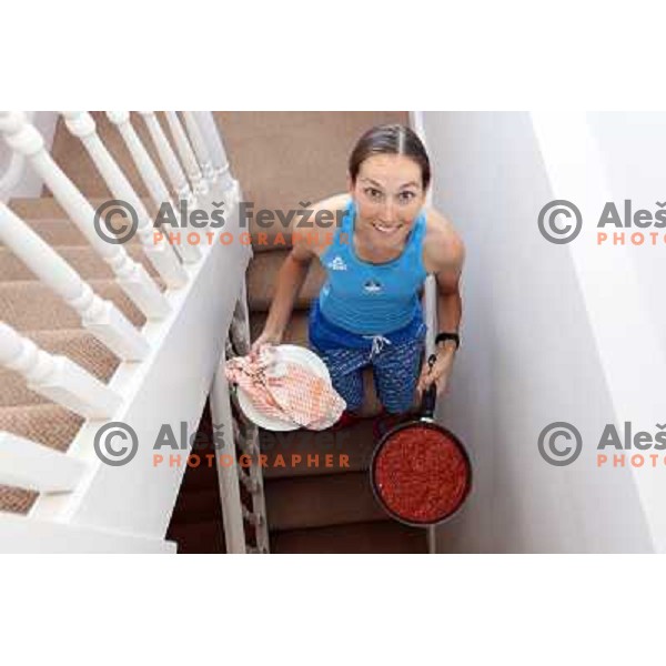 Blaza Klemencic serving lunch in apartment of hotel Camelia in Southend on Sea, british town and seaside resort in Essex during London 2012 Summer Olympic games on August 9, 2012 