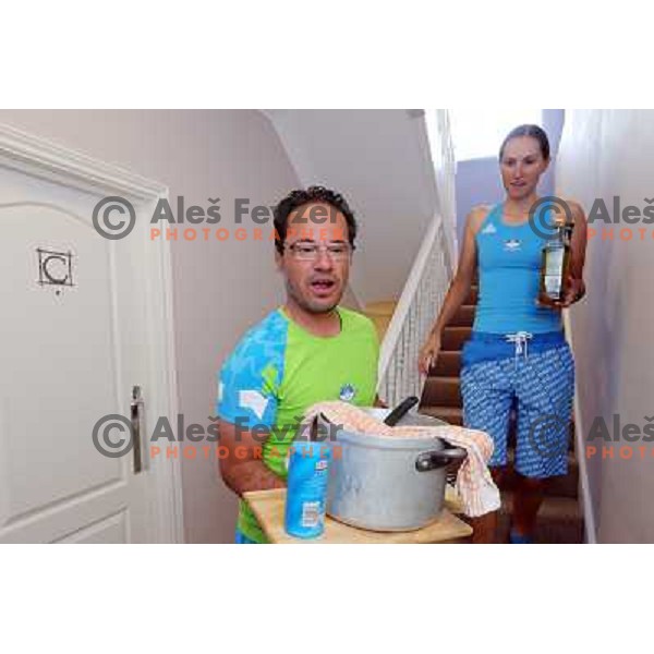 Robert Pintaric and Blaza Klemencic serving lunch in apartment of hotel Camelia in Southend on Sea, british town and seaside resort in Essex during London 2012 Summer Olympic games on August 9, 2012 