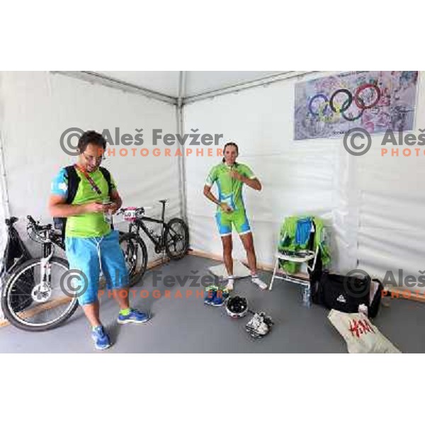 Robert Pintaric and Blaza Klemencic in team box at Hadleigh Farm in Essex during London 2012 Summer Olympic games on August 9, 2012 