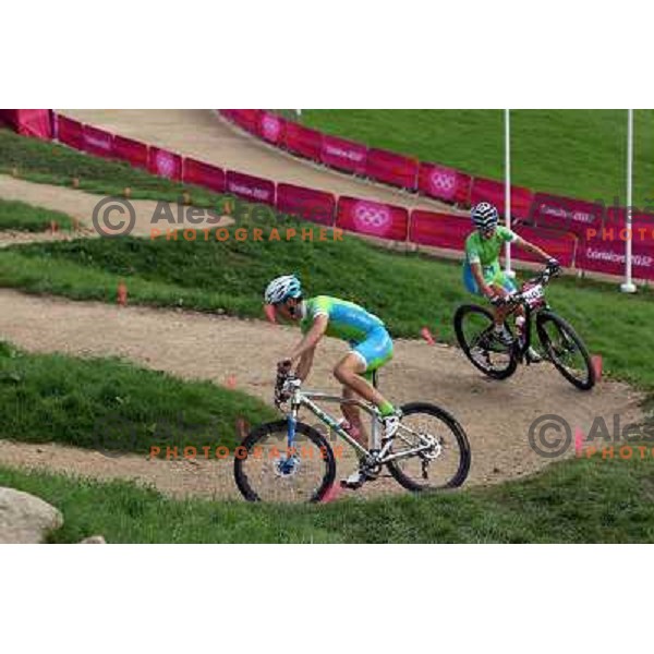 Coach Urban Ferencak and Tanja Zakelj of Slovenia during free practice session on Olympic MTB course at Hadleigh Farm near Southend on Sea,Essex during London 2012 Summer Olympic games on August 9, 2012 