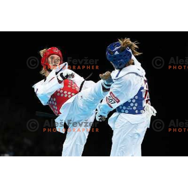 Franka Anic of Slovenia fights with Aitmukhambetova of Kazakhstan in Preliminary round of women\'s -67 kg taekwondo tournament in ExCel during London 2012 Summer Olympic Games, Great Britain on August 10, 2012 