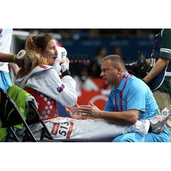 Franka Anic of Slovenia and coach Dusan Pantar in Preliminary round of women\'s -67 kg taekwondo tournament in ExCel during London 2012 Summer Olympic Games, Great Britain on August 10, 2012 