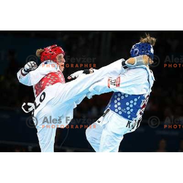 Franka Anic of Slovenia fights with Aitmukhambetova of Kazakhstan in Preliminary round of women\'s -67 kg taekwondo tournament in ExCel during London 2012 Summer Olympic Games, Great Britain on August 10, 2012 