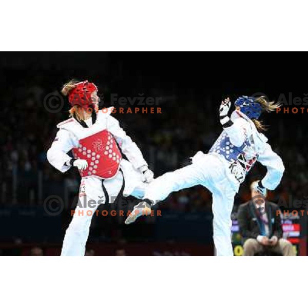 Franka Anic of Slovenia fights with Aitmukhambetova of Kazakhstan in Preliminary round of women\'s -67 kg taekwondo tournament in ExCel during London 2012 Summer Olympic Games, Great Britain on August 10, 2012 