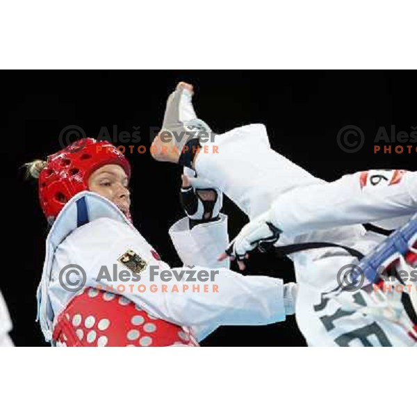 Helena Fromm of Germany fights with Hoang Chu of Vietnam in Preliminary round of women\'s -67 kg taekwondo tournament in ExCel during London 2012 Summer Olympic Games, Great Britain on August 10, 2012 