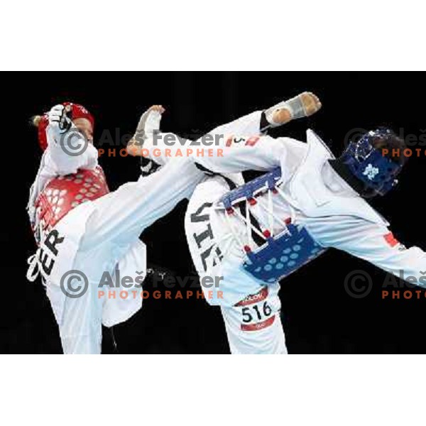 Helena Fromm of Germany fights with Hoang Chu of Vietnam in Preliminary round of women\'s -67 kg taekwondo tournament in ExCel during London 2012 Summer Olympic Games, Great Britain on August 10, 2012 