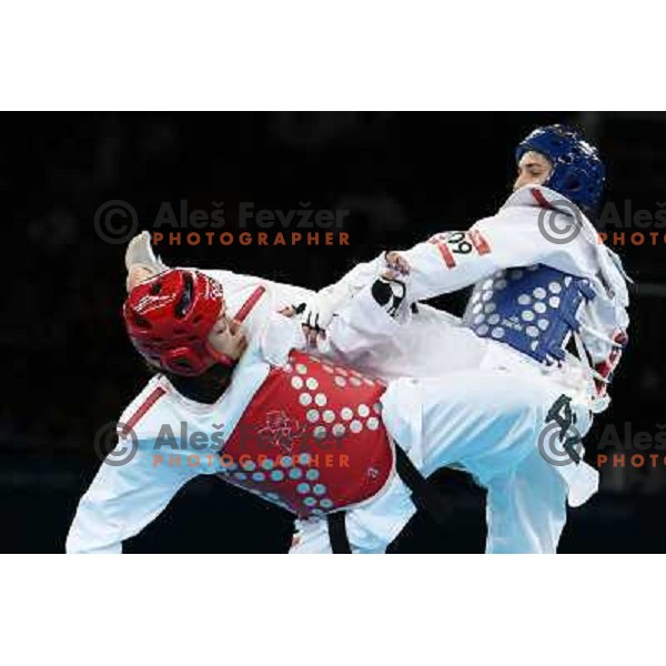 Karine Sergerie of Canada fights with Farida Azizova of Azerbaijdan in Preliminary round of women\'s -67 kg taekwondo tournament in ExCel during London 2012 Summer Olympic Games, Great Britain on August 10, 2012 