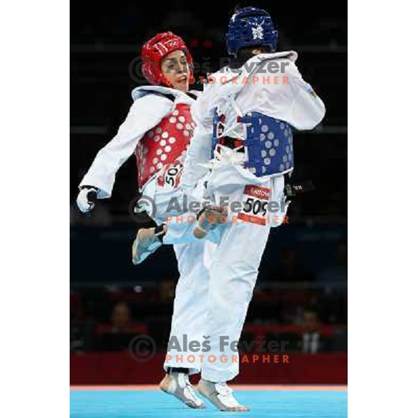 Karine Sergerie of Canada fights with Farida Azizova of Azerbaijdan in Preliminary round of women\'s -67 kg taekwondo tournament in ExCel during London 2012 Summer Olympic Games, Great Britain on August 10, 2012 