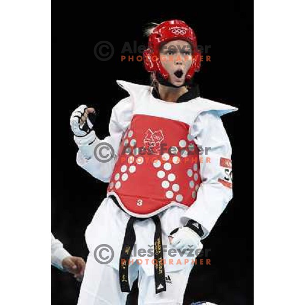 Helena Fromm of Germany fights with Hoang Chu of Vietnam in Preliminary round of women\'s -67 kg taekwondo tournament in ExCel during London 2012 Summer Olympic Games, Great Britain on August 10, 2012 