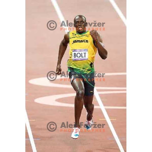 Usain Bolt of Jamaica, olympic gold medalist at 200 meters runs at Olympic stadium during London 2012 Summer Olympic games, GB on August 9, 2012 
