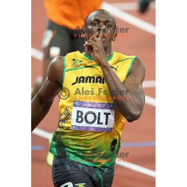 Usain Bolt of Jamaica, olympic gold medalist at 200 meters runs at Olympic stadium during London 2012 Summer Olympic games, GB on August 9, 2012 
