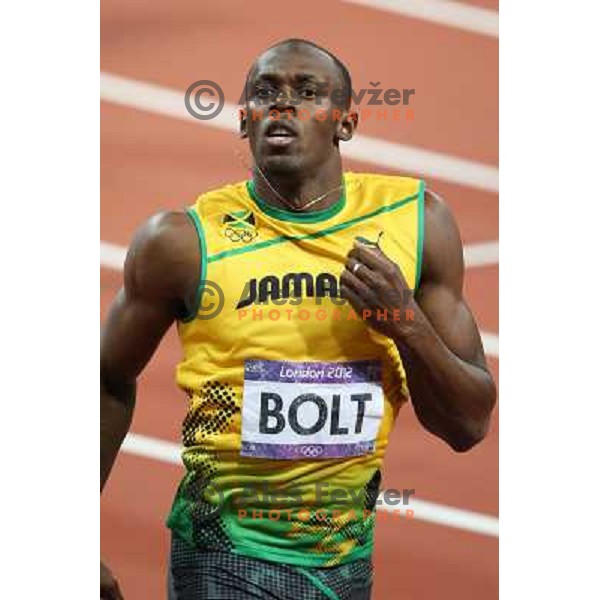 Usain Bolt of Jamaica, olympic gold medalist at 200 meters runs at Olympic stadium during London 2012 Summer Olympic games, GB on August 9, 2012 