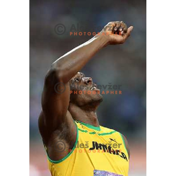 Usain Bolt of Jamaica, olympic gold medalist at 200 meters runs at Olympic stadium during London 2012 Summer Olympic games, GB on August 9, 2012 