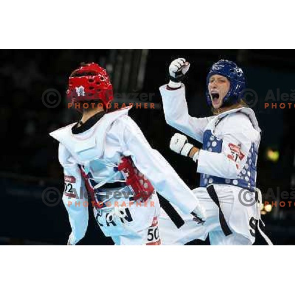 Karine Sergerie of Canada fights with Franka Anic of Slovenia in quarter-final of women\'s -67 kg taekwondo tournament in ExCel during London 2012 Summer Olympic Games, Great Britain on August 10, 2012 