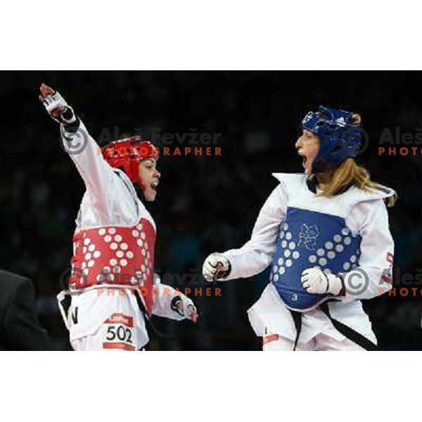 Karine Sergerie of Canada fights with Franka Anic of Slovenia in quarter-final of women\'s -67 kg taekwondo tournament in ExCel during London 2012 Summer Olympic Games, Great Britain on August 10, 2012 