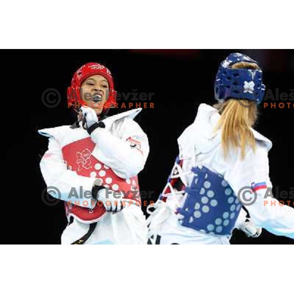 Franka Anic of Slovenia fights with Paige Mcpherson of USA in bronze medal match of women\'s -67 kg taekwondo tournament in ExCel during London 2012 Summer Olympic Games, Great Britain on August 10, 2012 