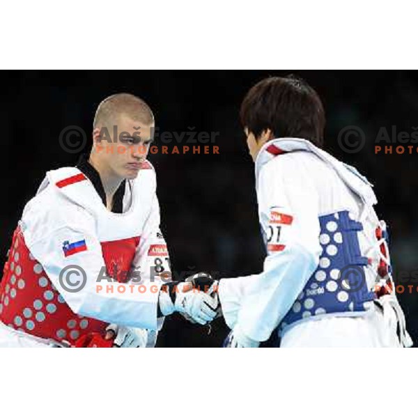 Ivan Konrad Trajkovic of Slovenia fights in Preliminary round of men\'s +80 kg taekwondo tournament in ExCel during London 2012 Summer Olympic Games, Great Britain on August 11, 2012 
