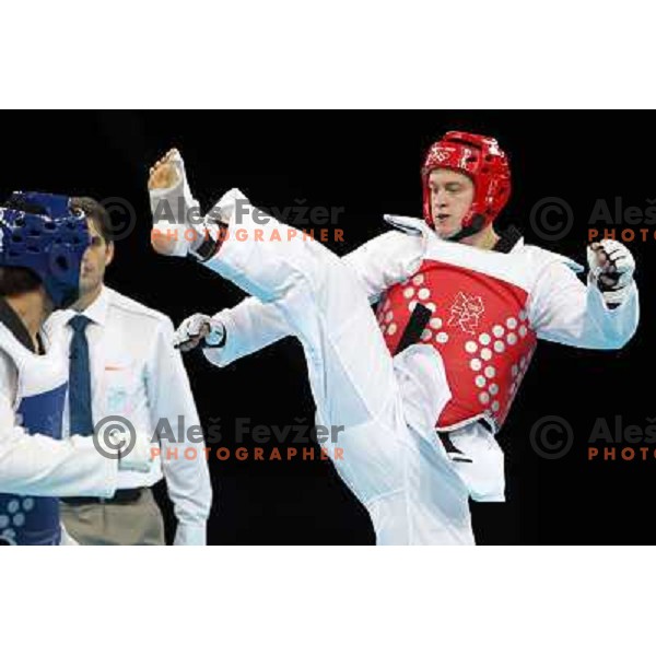 Ivan Konrad Trajkovic of Slovenia fights in Preliminary round of men\'s +80 kg taekwondo tournament in ExCel during London 2012 Summer Olympic Games, Great Britain on August 11, 2012 