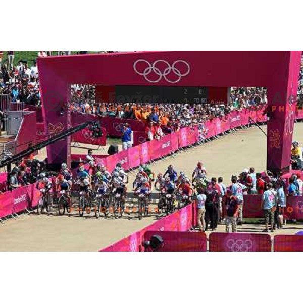 Blaza Klemencic and Tanja Zakelj of Slovenia in action during women\'s cross country race at Hadleigh farm near Southend-on-Sea during London 2012 Summer Olympic Games, Great Britain on August 11, 2012 
