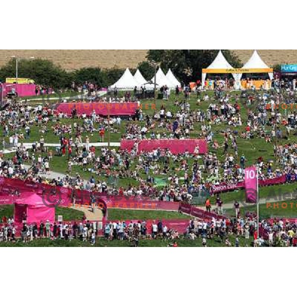 Record crowd of fans and spectators watching action during women\'s cross country race at Hadleigh farm near Southend-on-Sea during London 2012 Summer Olympic Games, Great Britain on August 11, 2012 
