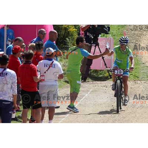 Robert Pintaric and Tanja Zakelj of Slovenia in action during women\'s cross country race at Hadleigh farm near Southend-on-Sea during London 2012 Summer Olympic Games, Great Britain on August 11, 2012 