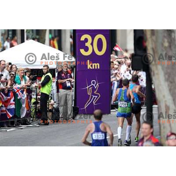 Primoz Kobe of Slovenia runs at Men\'s marathon on the streets of London during 2012 Summer Olympic Games, Great Britain on August 12, 2012 