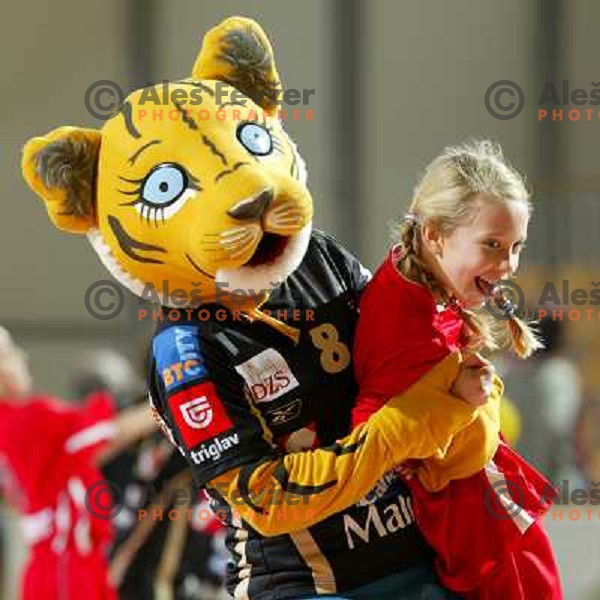  Krim Mascot holding junior player during half-time of women\'s EHF Championsleague game Krim Mercator-Dynamo Volgograd in Ljubljana, Slovenia. Krim Mercator won 41-34. Photo by Ales Fevzer