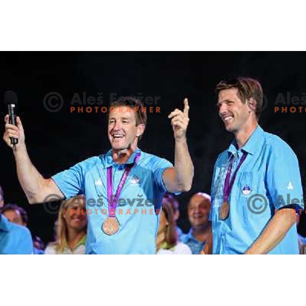 Iztok Cop and Luka Spik during Reception for Slovenia Olympic team from London 2012 Olympic games at Congress Square in Ljubljana on August 14, 2012 
