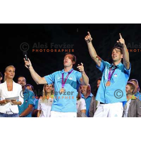 Iztok Cop and Luka Spik during Reception for Slovenia Olympic team from London 2012 Olympic games at Congress Square in Ljubljana on August 14, 2012 