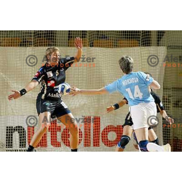  Natasa Derepasko tries to block shot of Mokhova during women\'s EHF Championsleague game Krim Mercator-Dynamo Volgograd in Ljubljana, Slovenia. Krim Mercator won 41-34. Photo by Ales Fevzer