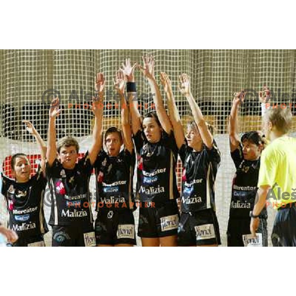 Krim Mercator players in block during women\'s EHF Championsleague game Krim Mercator-Dynamo Volgograd in Ljubljana, Slovenia. Krim Mercator won 41-34. Photo by Ales Fevzer