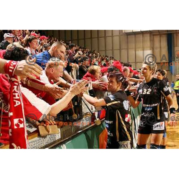 Tanja Oder and Anja Freser salute fans after women\'s EHF Championsleague game Krim Mercator-Dynamo Volgograd in Ljubljana, Slovenia. Krim Mercator won 41-34. Photo by Ales Fevzer