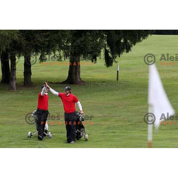 Aljosa Berc and Anze Kopitar of Slovenia, LA Kings- NHL ice-hockey star during Audi Quattro golf tournament on King\'s golf course at Bled, Slovenia on September 1, 2012. 
