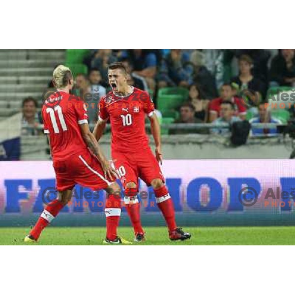 Granit Xhaka of Switzerland and teammates celebrate goal during football match Slovenia-Switzerland for FIFA 2014 World Cup Brasil Qualifiers, played in Arena Stozice, Ljubljana, Slovenia on September 7, 2012 