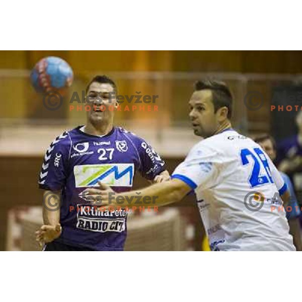 Blaz Klec, Martin Hummel (L-R) in action during EHF cup handball match played in Tabor hall, Maribor, 8.9.2012 