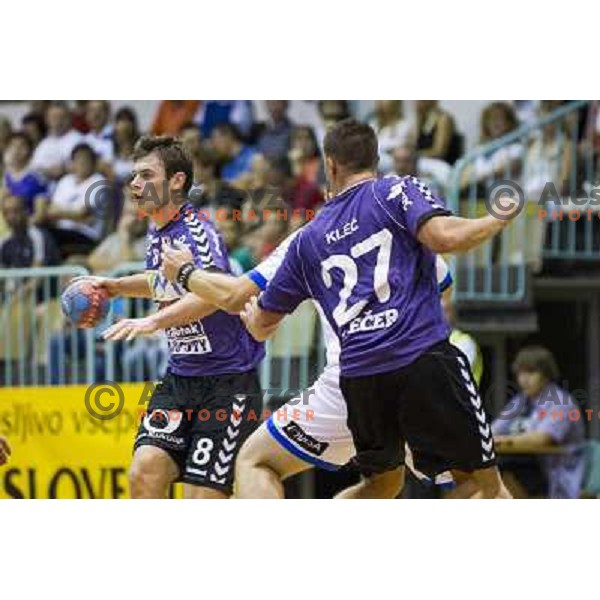 Nikola Spelic and Blaz Klec (L-R) in action during EHF cup handball match played in Tabor hall, Maribor, 8.9.2012 