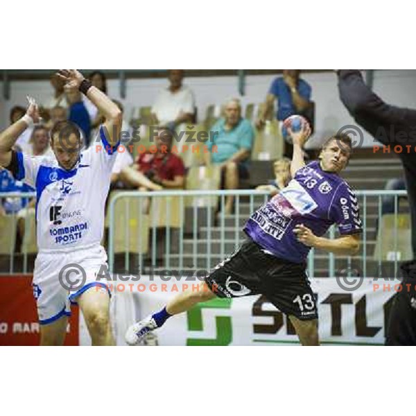 Simon Razgor (R) in action during EHF cup handball match played in Tabor hall, Maribor, 8.9.2012 